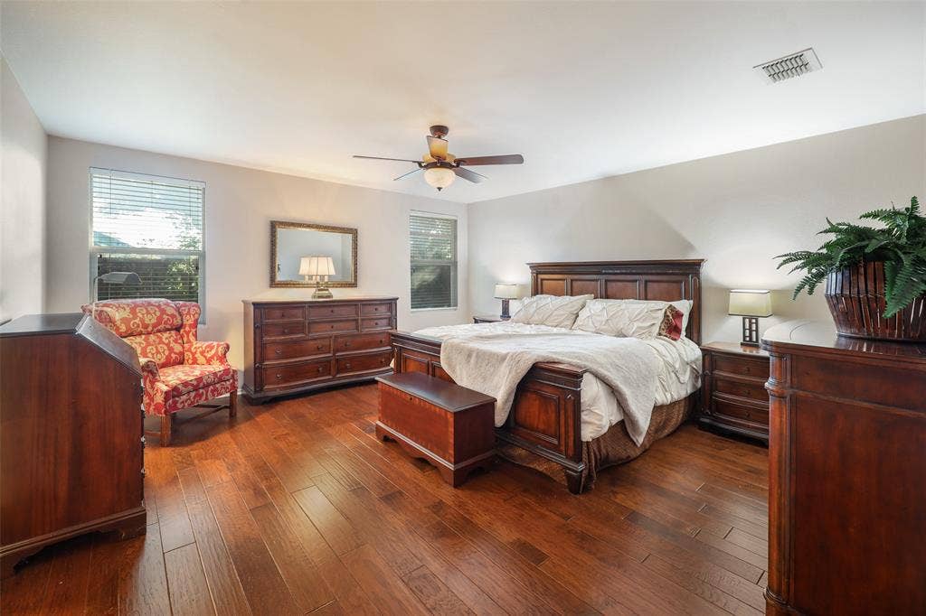 5409 Running Brook Lane, McKinney, TX 75071 Recessed lighting, wood-finish flooring, ceiling fan with integrated lighting, multiple windows, and neutral wall tones