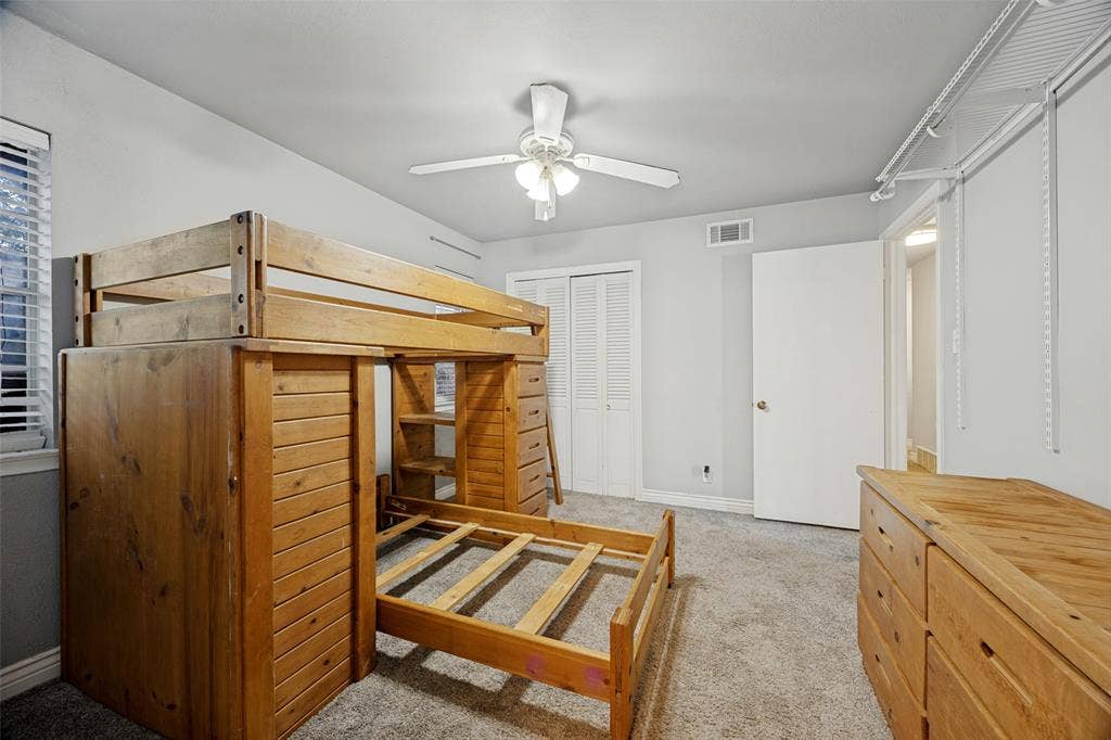 6401 Stonewall Street, Greenville, TX 75402 Wall-to-wall carpeting and white walls