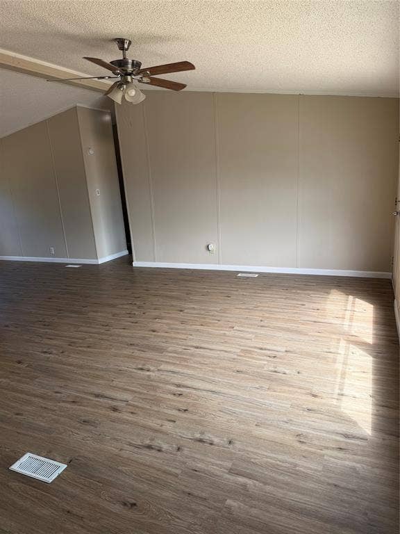 143 Summit Ridge Lane, Springtown, TX 76082 Wood-finish flooring throughout, complemented by light-toned wall paneling