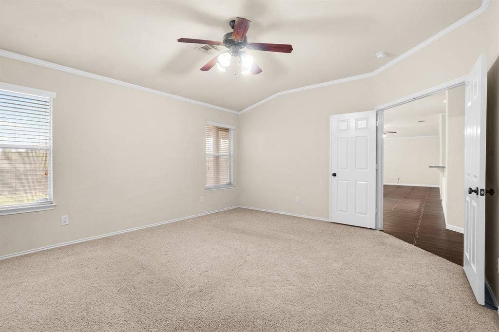 10108 Parker Springs Drive, Waco, TX 76708 Neutral-toned carpeting paired with light wall finishes