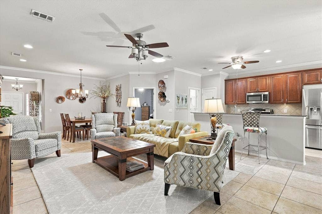 1118 Imperial Valley Lane, Frisco, TX 75036 Living Room opens to Dining Room and Kitchen