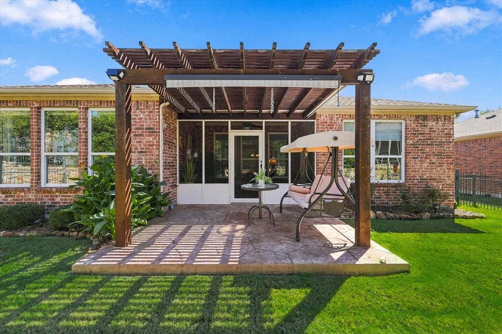 1118 Imperial Valley Lane, Frisco, TX 75036 Wood pergola with a stamped concrete patio