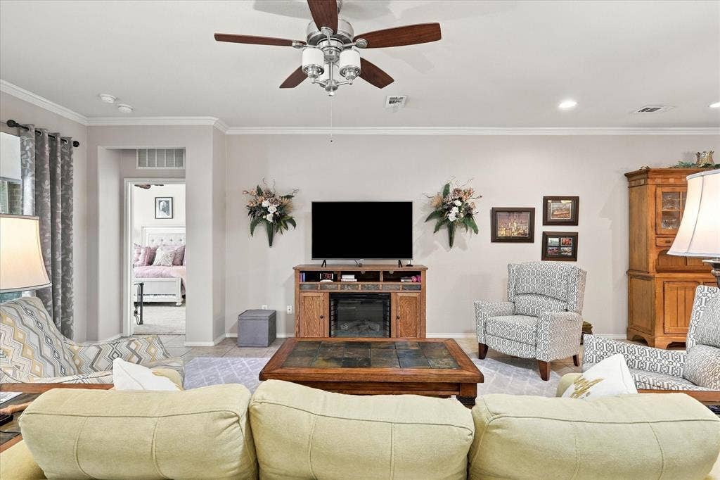 1118 Imperial Valley Lane, Frisco, TX 75036 Recessed lighting, crown molding, and a ceiling fan with light fixture