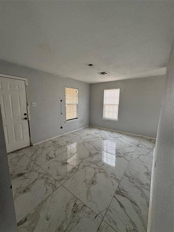 415 E 20th Street, Waco, TX 76705 Large format tile flooring with a marble-effect finish