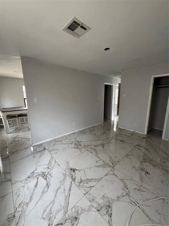415 E 20th Street, Waco, TX 76705 Glossy tile flooring with veined detailing throughout
