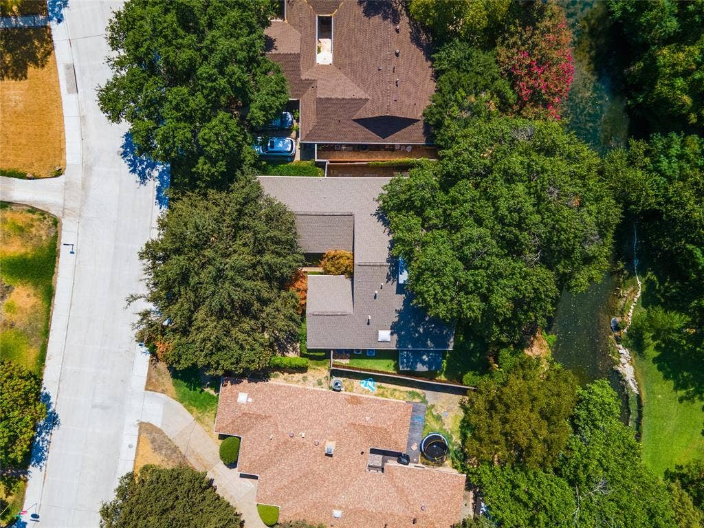17411 Oakington Court, Dallas, TX 75252 View from the north - 17411 is the middle home here.