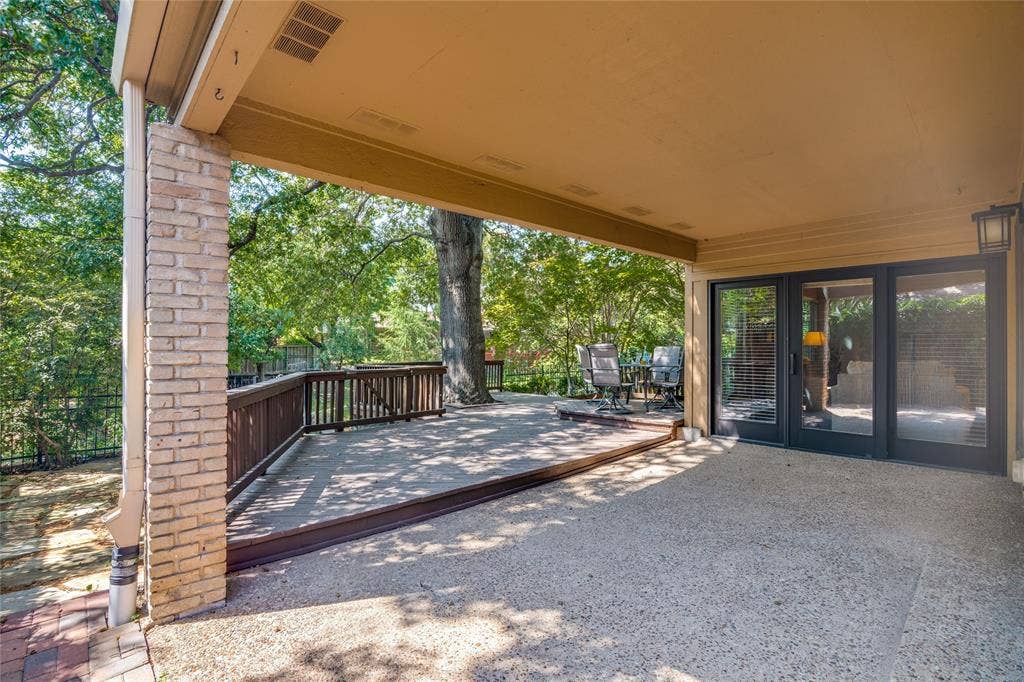17411 Oakington Court, Dallas, TX 75252 Wonderful covered patio is accessible from the Living Room and Kitchen/Breakfast Room.