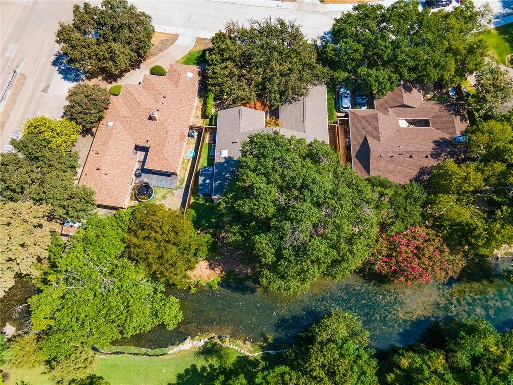 17411 Oakington Court, Dallas, TX 75252 Overall view from the rear of the property.