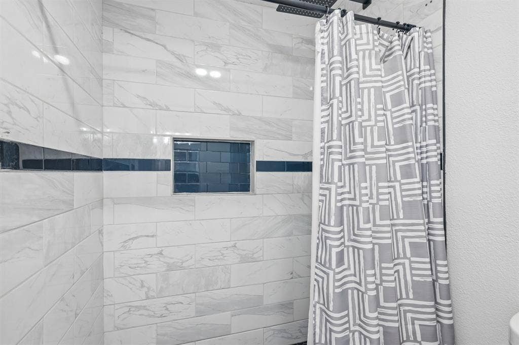 322 Valley Spring Drive, Arlington, TX 76018 Updated walk-in shower in primary bath