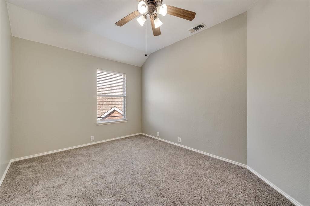 2873 Del Largo Way, Frisco, TX 75033 Bedroom 4 Vaulted ceiling with a ceiling fan, neutral carpet flooring, and a single window with blinds