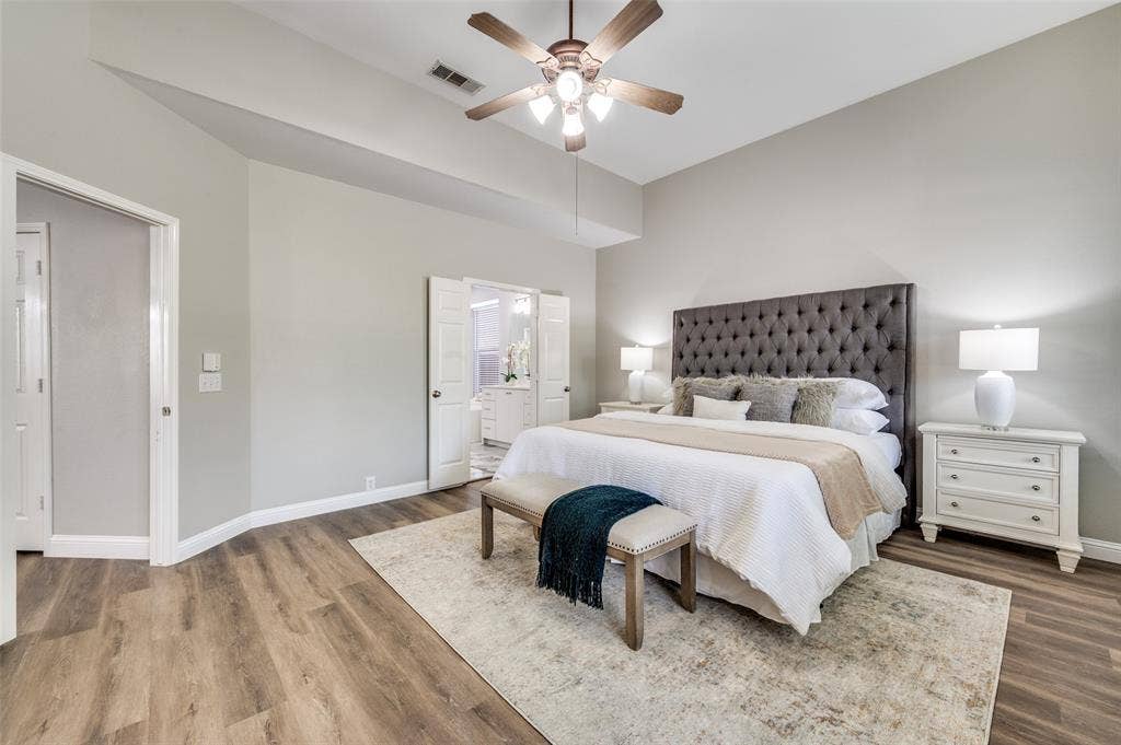 2873 Del Largo Way, Frisco, TX 75033 Vaulted ceilings, wood-finish flooring, ceiling fan, and double doors