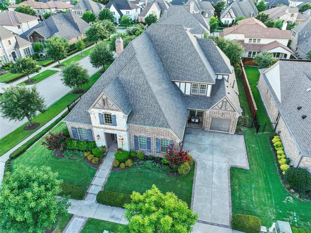 12921 Railhead Court, Frisco, TX 75033 From the climate-controlled 800-bottle wine cellar and custom interior finishes to the Foley pool, oversized spa, limestone outdoor living center, extensive garage space, and numerous recent mechanical and exterior improvements, this Newman Village residence has been thoughtfully enhanced at nearly every turn. Designed for those who appreciate quality craftsmanship, generous entertaining spaces, and resort-inspired outdoor living, the home delivers an exceptional combination of elegance, functionality, and comfort in one of the area's distinctive residential communities.