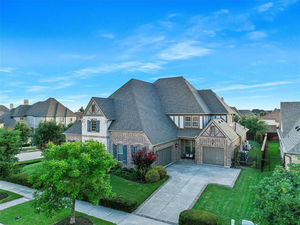 12921 Railhead Court, Frisco, TX 75033 The landscaping has also been thoughtfully enhanced with mature plantings, including five holly trees, five magnolia trees, and a mature oak tree. A wrought iron fence, refinished in 2024, complements the grounds and outdoor living environment.