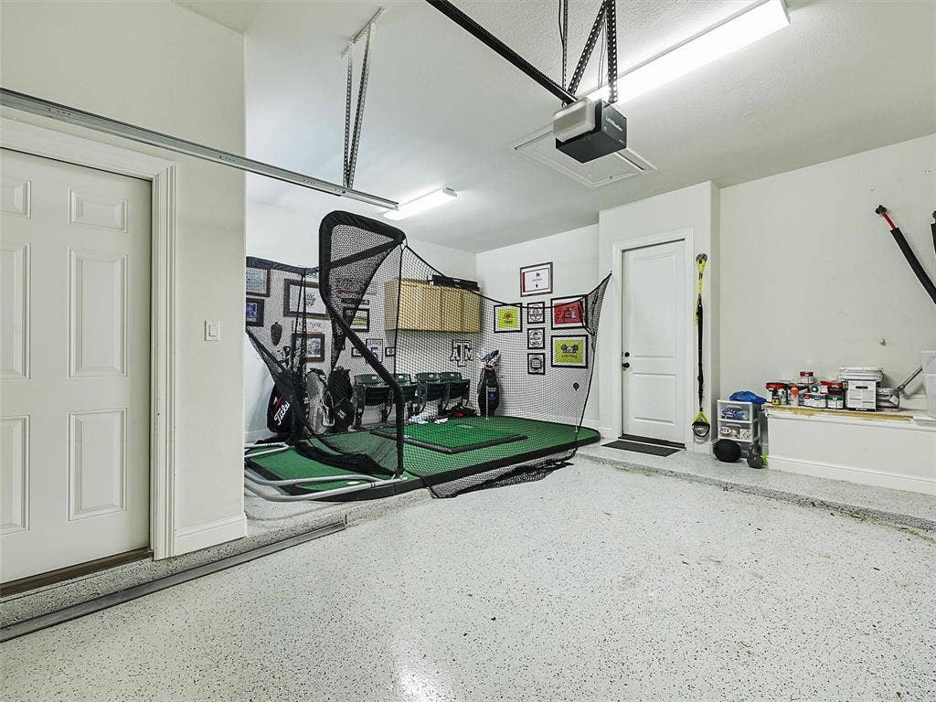12921 Railhead Court, Frisco, TX 75033 Even the garage configuration offers something unexpected. The split three-car garage provides an unusually generous footprint comparable in overall space to many five-car garages due to bonus landing areas incorporated into both garage locations. Garage #1 measures approximately 20 by 27 feet, while Garage #2 measures approximately 21 by 22 feet, offering substantial room for vehicles, storage, equipment, or hobby needs. Garage door coils and rollers were replaced in 2024.