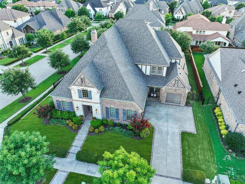 12921 Railhead Court, Frisco, TX 75033 Significant improvements throughout the property provide additional value and peace of mind. A new roof was installed in 2025 using IKO Cambridge Class 3 laminate shingles and includes a transferable warranty. New gutters and flashing were also completed in 2025. The home's water system was enhanced in 2023 with an Aquasana Rhino whole-home water filtration system and Aquasana salt-free water softener. A Rinnai gas tankless water heater conversion was also completed in 2023, providing a modern approach to the home's hot water system. The air-conditioning systems received updated coils in 2023 and have been professionally maintained on a six-month schedule. HUGE OPEN YARD SPACES. GREAT for play, pets, and family entertaining.