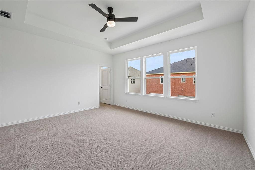 1374 Marsh Lane, Frisco, TX 75033 Featuring a neutral color palette, oversized windows and plush carpeting, your new owner's suite was designed for rest and relaxation!