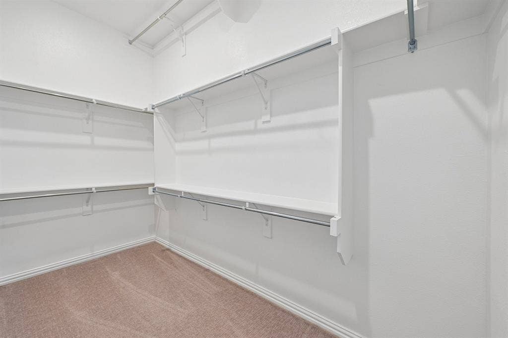 1374 Marsh Lane, Frisco, TX 75033 With plenty of space for two and seasonal hanging racks, this dream closet is waiting for you to fill it up!