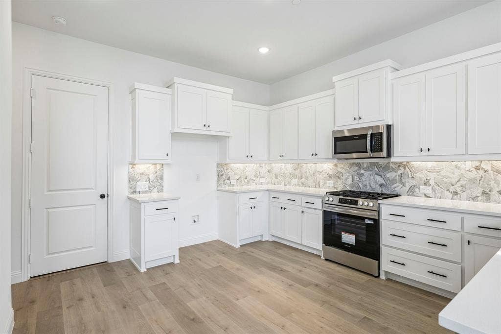 1374 Marsh Lane, Frisco, TX 75033 No shortage of storage or prep space in this dream kitchen!