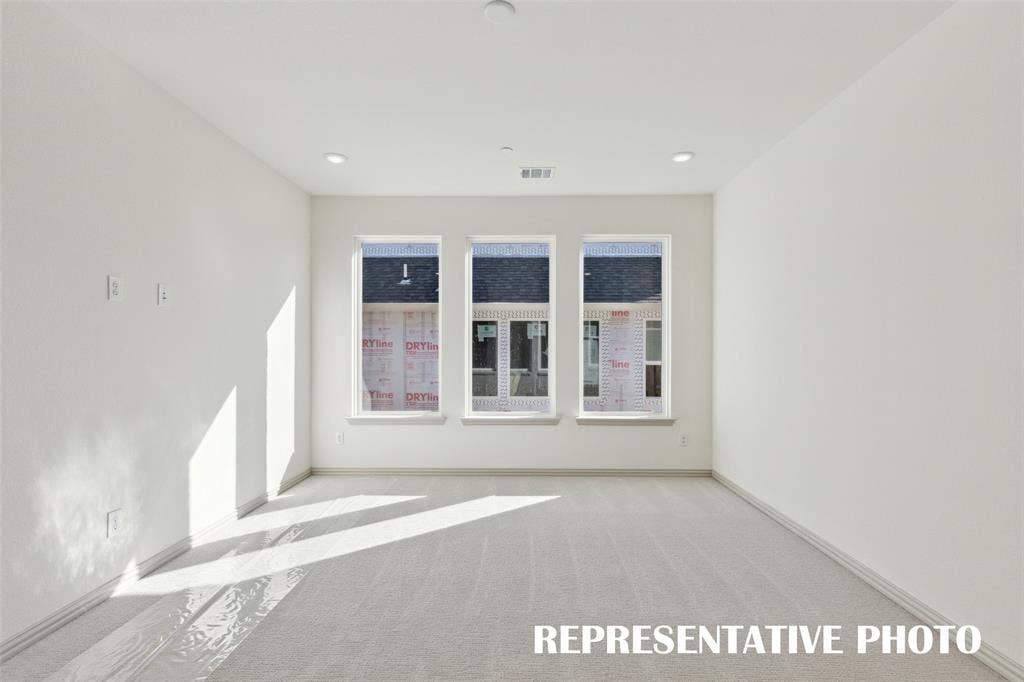 1401 Rooted Road, Frisco, TX 75033 Plenty of family fun time to be enjoyed in this light filled game room! REPRESENTATIVE PHOTO