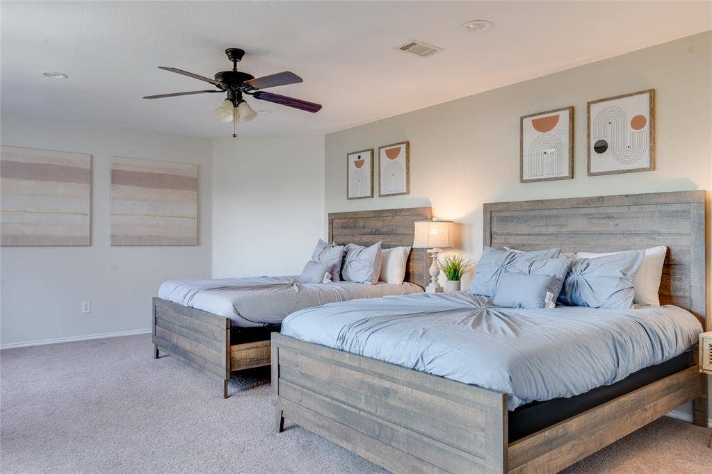 6003 Lloyd Court, Dallas, TX 75252 Neutral tone wall paint, recessed lighting, ceiling fan light fixture, and carpet flooring