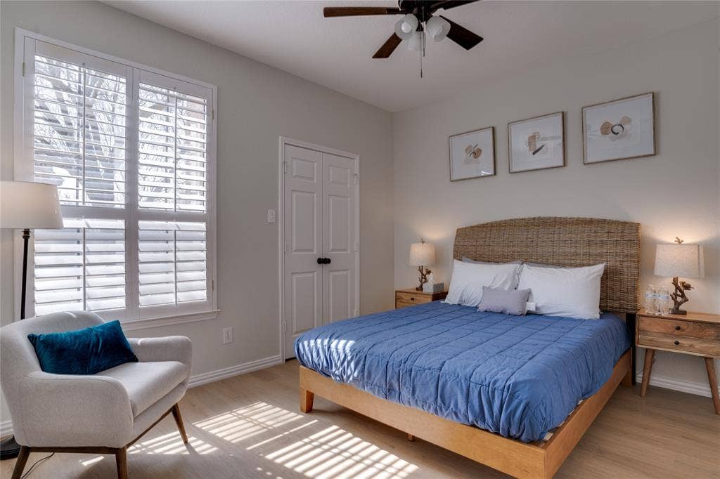 6003 Lloyd Court, Dallas, TX 75252 Wood-finish flooring, plantation shutters, ceiling fan, and built-in closet