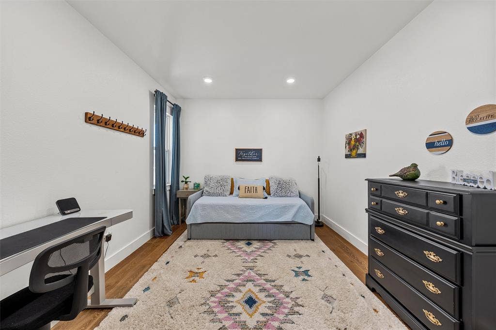 446 Wade Drive, Eddy, TX 76524 Recessed lighting, wood-finish flooring, white walls, and a window with curtains (Office)