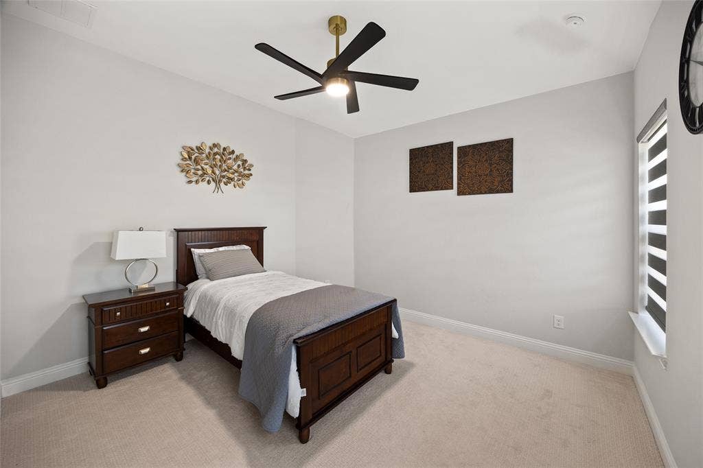 12512 Deer Trail, Frisco, TX 75035 Recessed lighting, ceiling fan, carpeting, and window with blinds