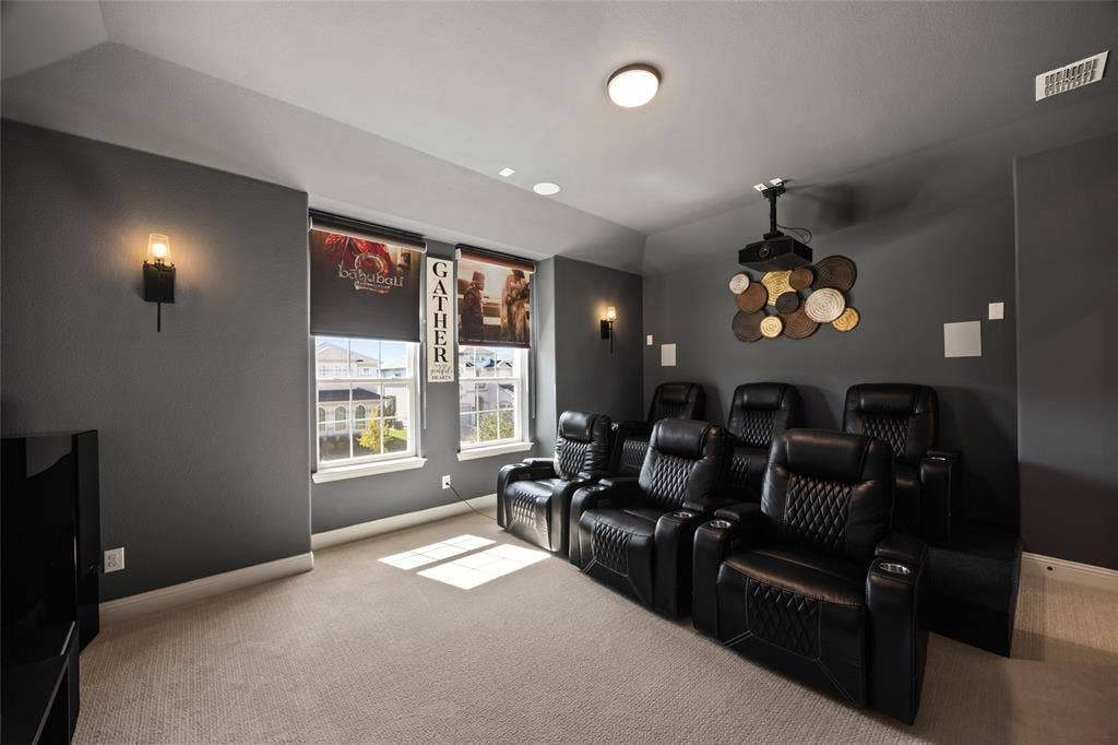 12512 Deer Trail, Frisco, TX 75035 Dedicated media room with plush carpeting, wall-mounted sconces, and recessed ceiling lighting