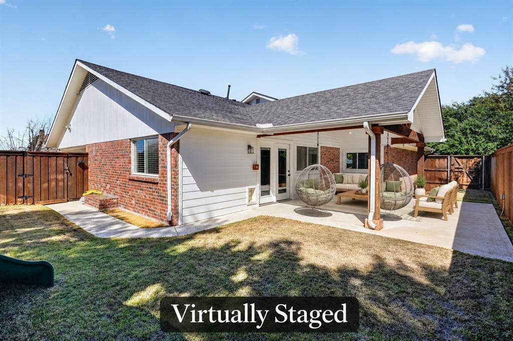 4448 Cleveland Drive, Plano, TX 75093 Two swinging egg chairs invite you to unwind beneath the spacious covered patio, with wood beam accents and easy access to the kitchen and den.