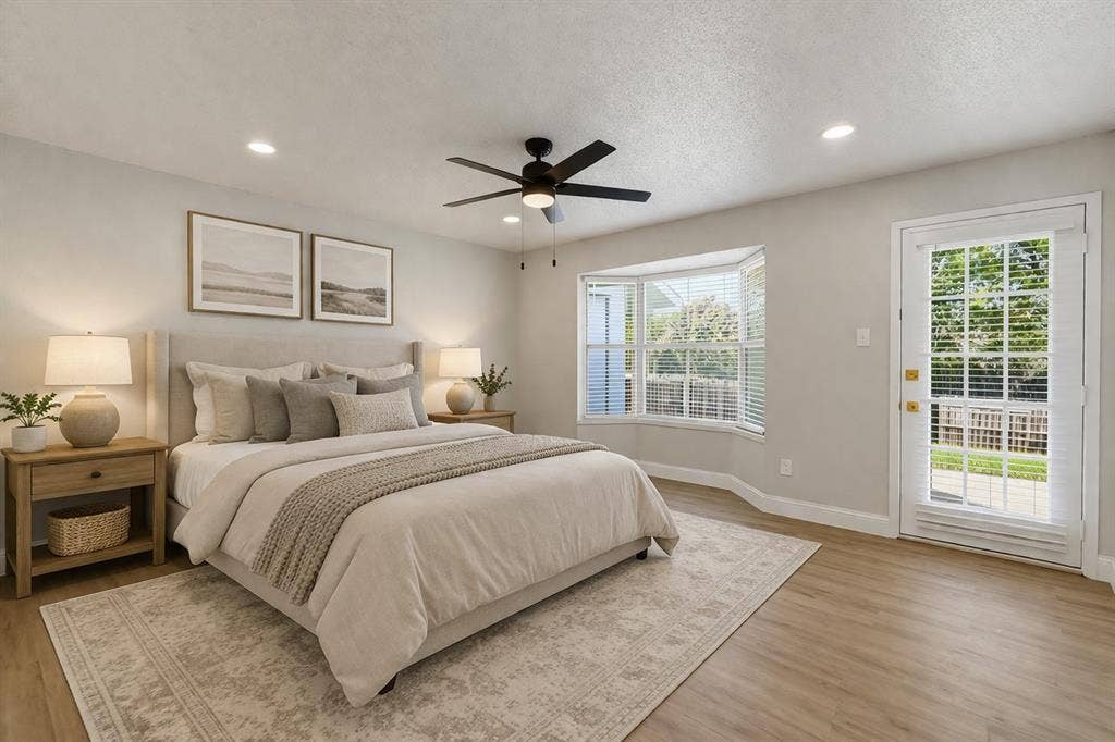 5514 Round Rock Road, Garland, TX 75044 Bay window with blinds, wood-finish flooring, recessed lighting, ceiling fan, and a patio door with integrated blinds