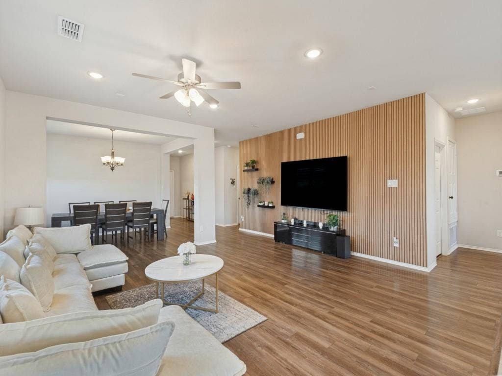 3825 S Courtney Court, Heartland, TX 75126 Wood-finish flooring throughout, recessed lighting, and a ceiling fan