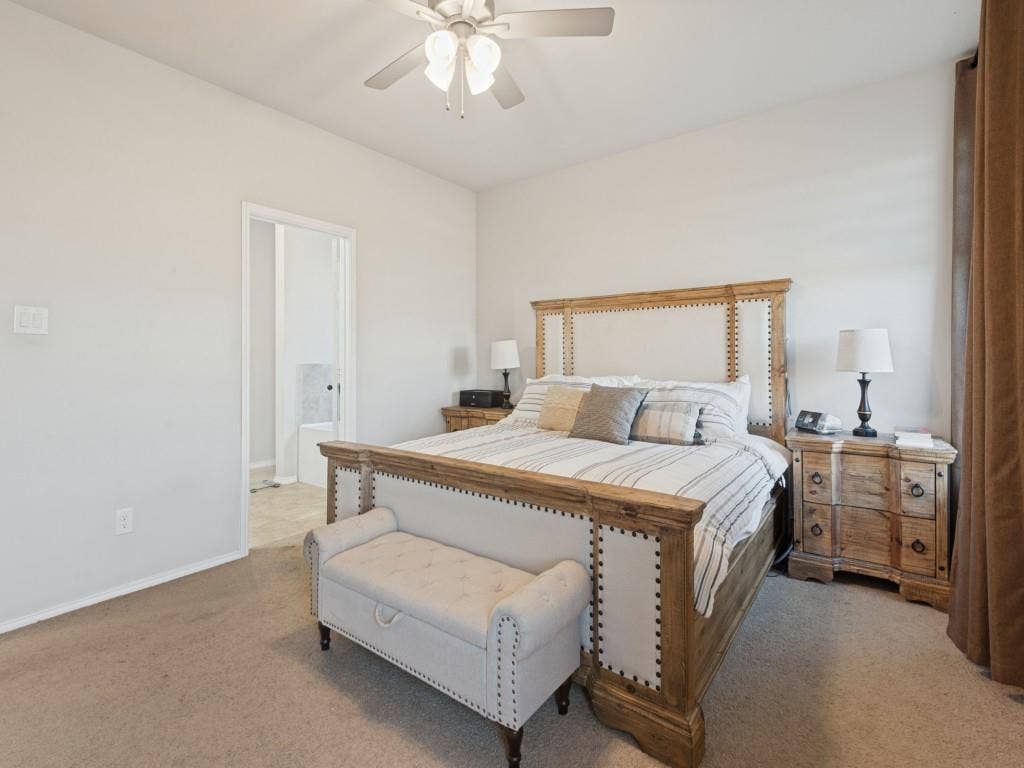 3825 S Courtney Court, Heartland, TX 75126 Recessed lighting with a ceiling fan, light-toned carpeting, and a doorway leading to an additional space with tile flooring