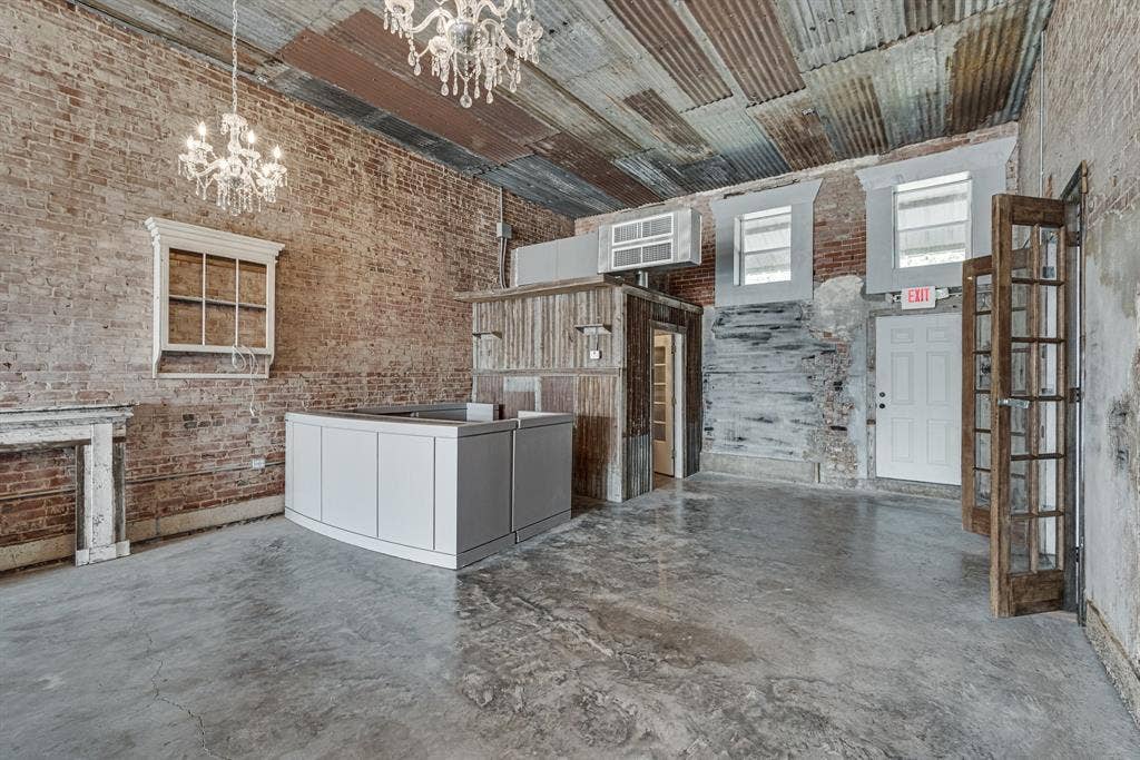 102 / 104 S Main Street, Milford, TX 76670 104 S Main. Restroom in the back left corner. Exit door to the courtyard, and french doors leading to 102 S Main