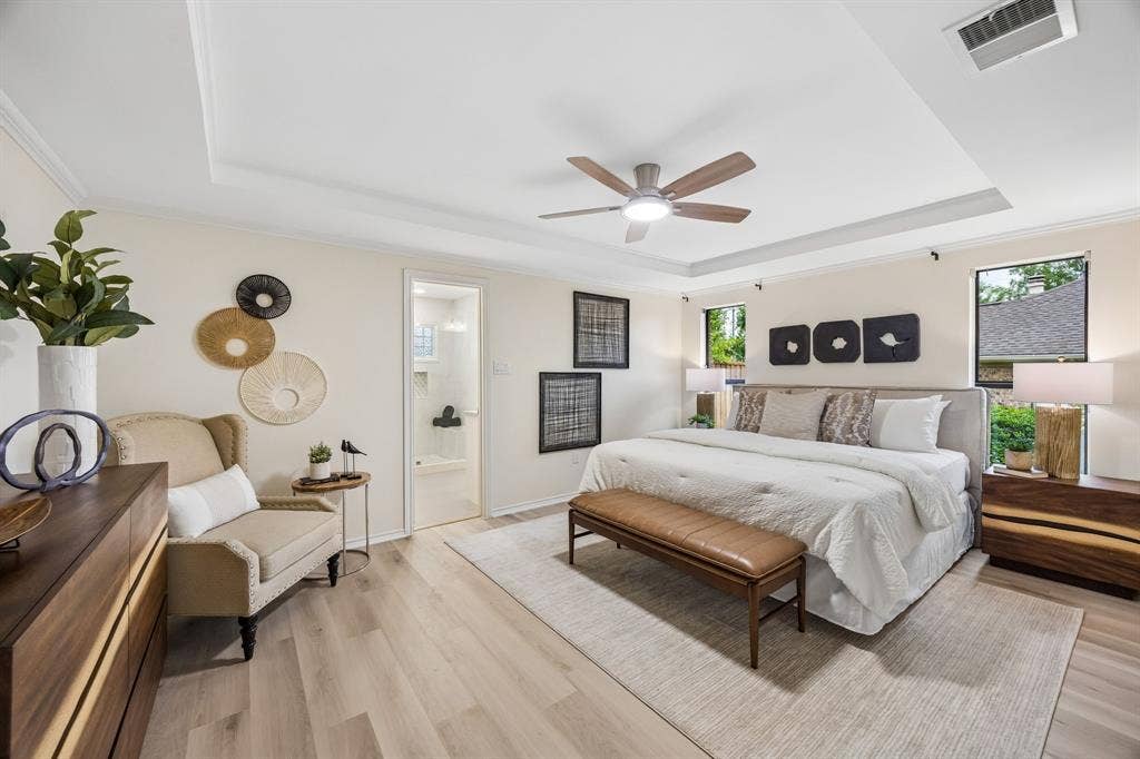 4540 New Orleans Drive, Plano, TX 75093 Tray ceiling with a ceiling fan, light wood-finish flooring, recessed windows, and white trim