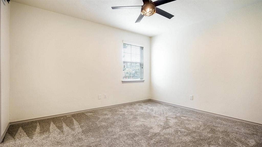 2616 Ellis Court, Plano, TX 75075 Neutral wall finish, ceiling fan with integrated lighting, window with blinds, and neutral carpet flooring
