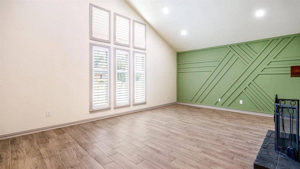 2616 Ellis Court, Plano, TX 75075 Vaulted ceilings, wood-finish flooring, and recessed lighting