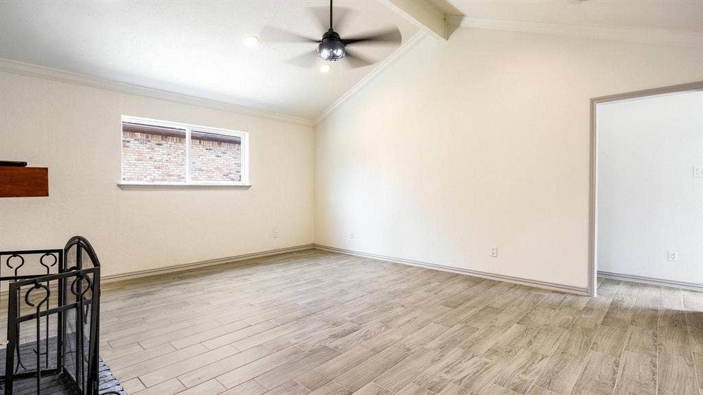 2616 Ellis Court, Plano, TX 75075 Vaulted ceiling, wood-finish flooring, recessed lighting, and ceiling fan with integrated lighting