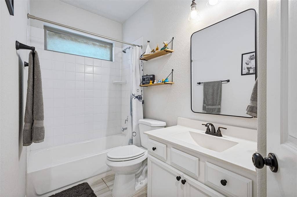 912 Lady Bird Drive, McKinney, TX 75071 Downstairs full bathroom, Brand new toilet!