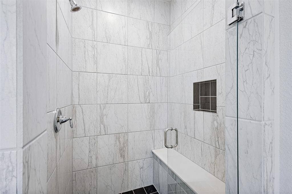 912 Lady Bird Drive, McKinney, TX 75071 Primary standing shower with bench!