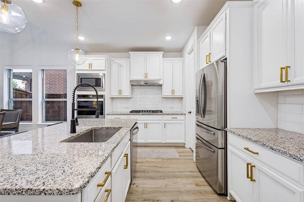 912 Lady Bird Drive, McKinney, TX 75071 Updated hardware and lighting!
