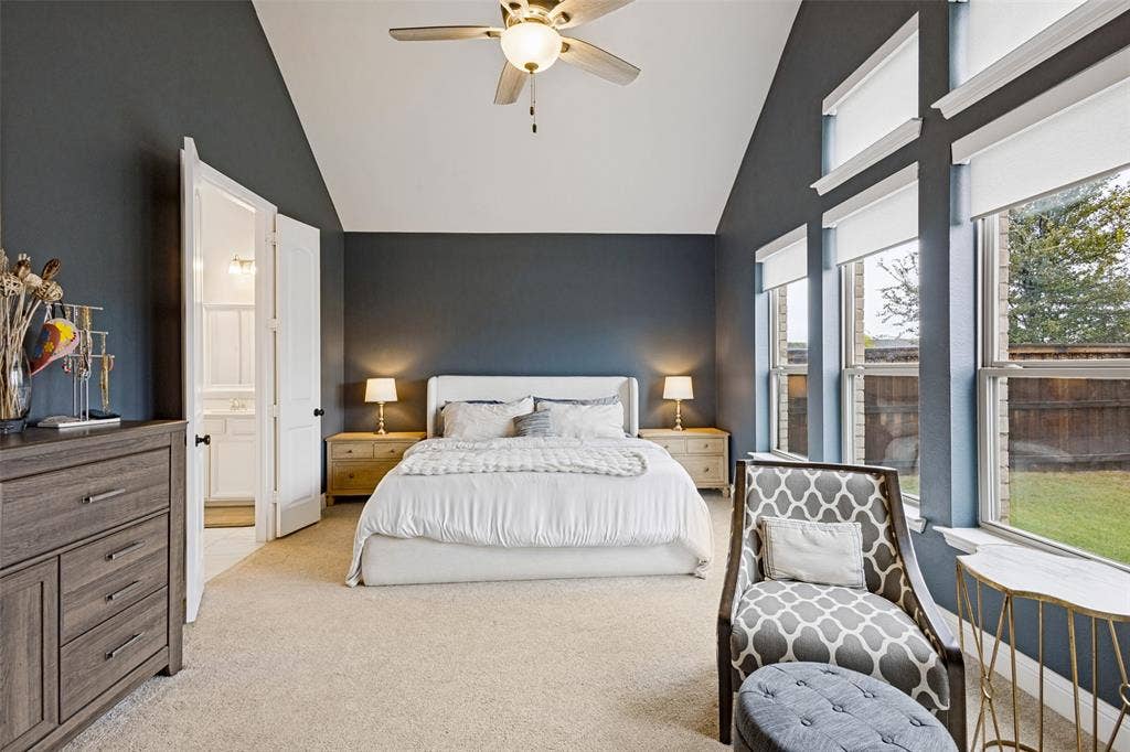912 Lady Bird Drive, McKinney, TX 75071 primary with large windows outlooking backyard. Large high ceilings