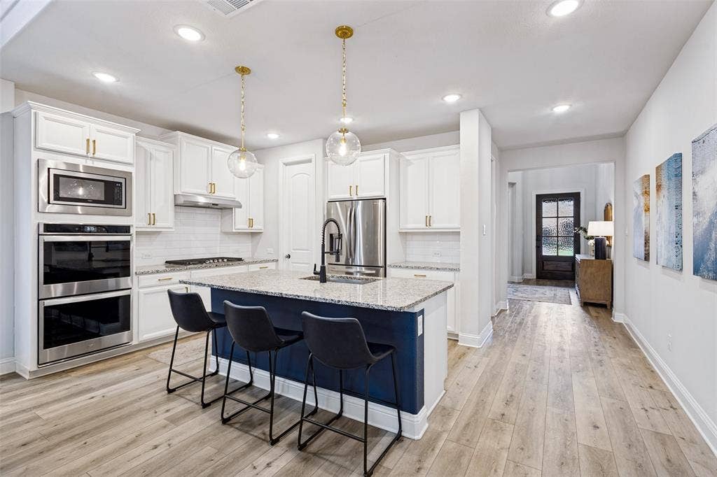 912 Lady Bird Drive, McKinney, TX 75071 Large kitchen overlooking the dining