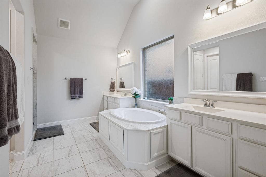 912 Lady Bird Drive, McKinney, TX 75071 Toilet closet, separte shower, and bathtub