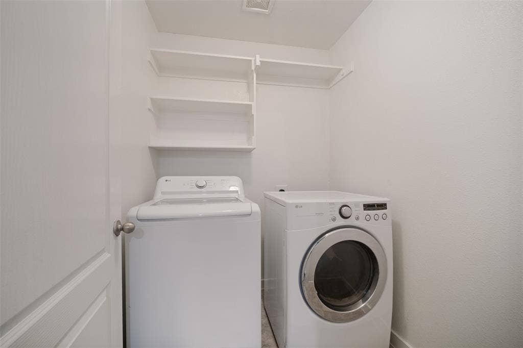 2324 Neff Lane, Forney, TX 75126 Laundry area featuring white built-in wall shelving
