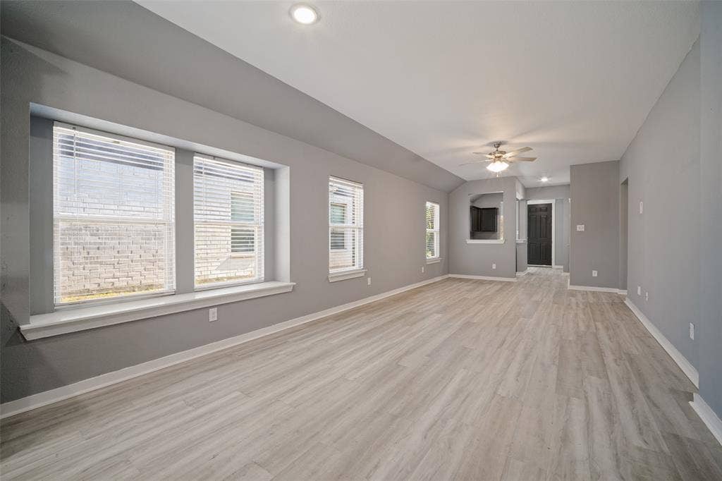 2324 Neff Lane, Forney, TX 75126 Open-concept room featuring wood-finish flooring, a recessed window seat, recessed lighting, and a ceiling fan