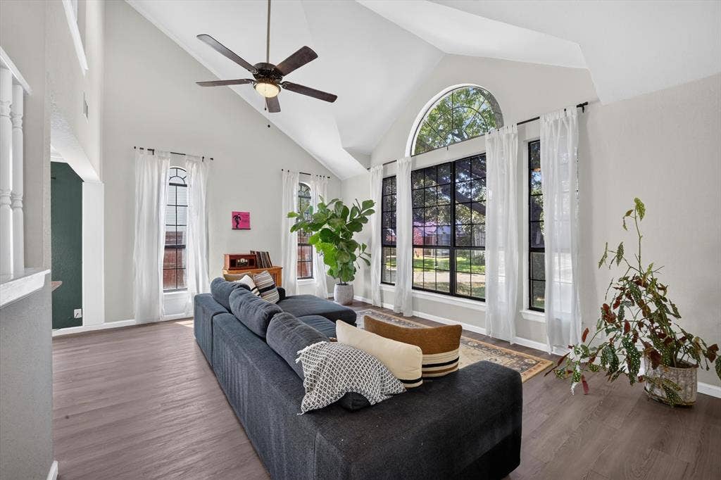 519 Fox Creek Court, Denton, TX 76209 Vaulted ceilings with ceiling fan, wood-finish flooring, and arched window