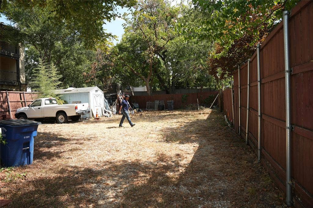 5108 Manett Street, Dallas, TX 75206 Rear yard area leading toward the back alley gate.