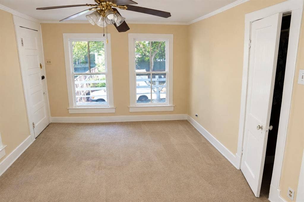 5108 Manett Street, Dallas, TX 75206 Rear duplex bedroom featuring natural light and clean flooring.
