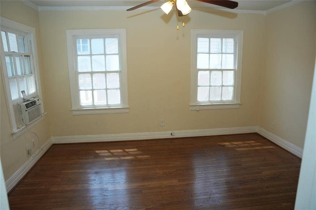 5108 Manett Street, Dallas, TX 75206 Bedroom in front duplex with dual windows and hardwood floors.