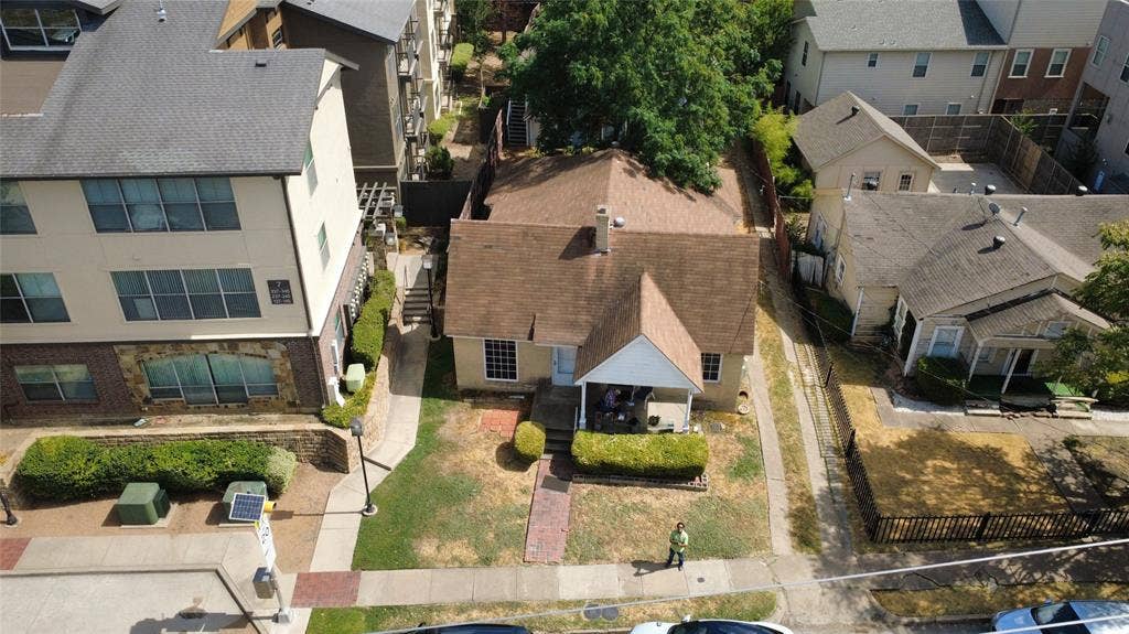 5108 Manett Street, Dallas, TX 75206 Oblique aerial view displaying property rooflines and neighboring context.